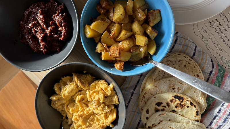 EGGS AND POATOES W/ THE BIG PAPER